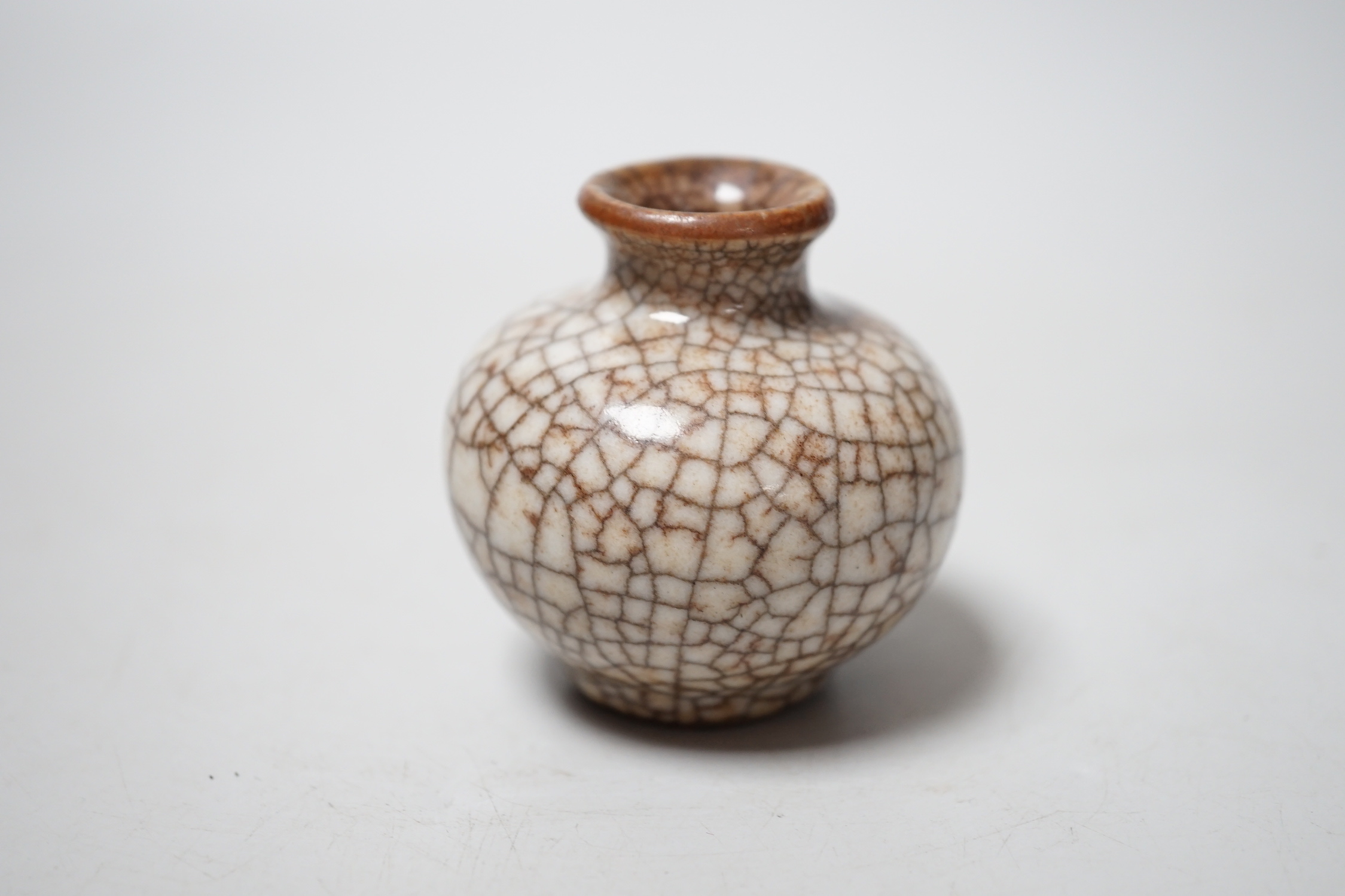 A Chinese crackle glazed small jar, 5.5cm high